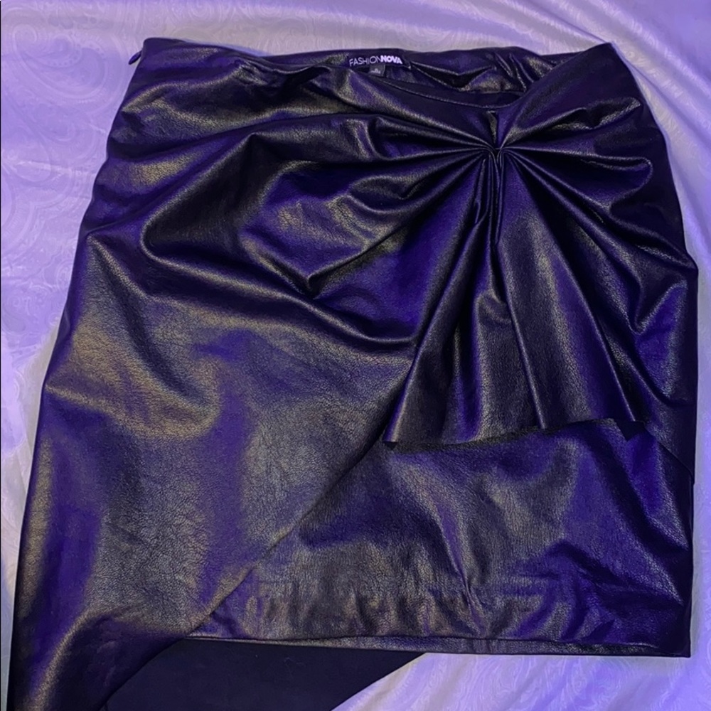 A-symmetrical faux leather skirt.